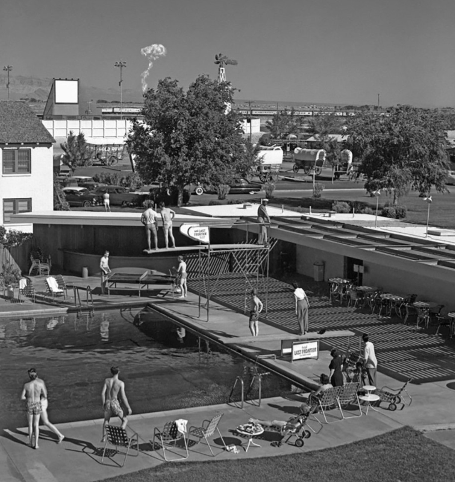 Tourists in Las Vegas, Nevada, watching an atomic bomb test seventy five mile away, 1950s 